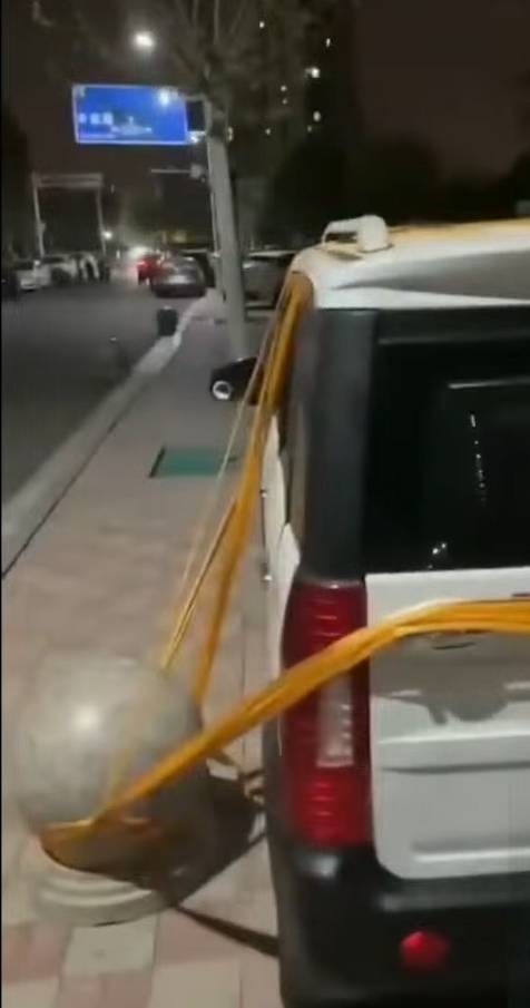 Rampant Vehicle Theft Drives Creative Security Measures on China's Sidewalks